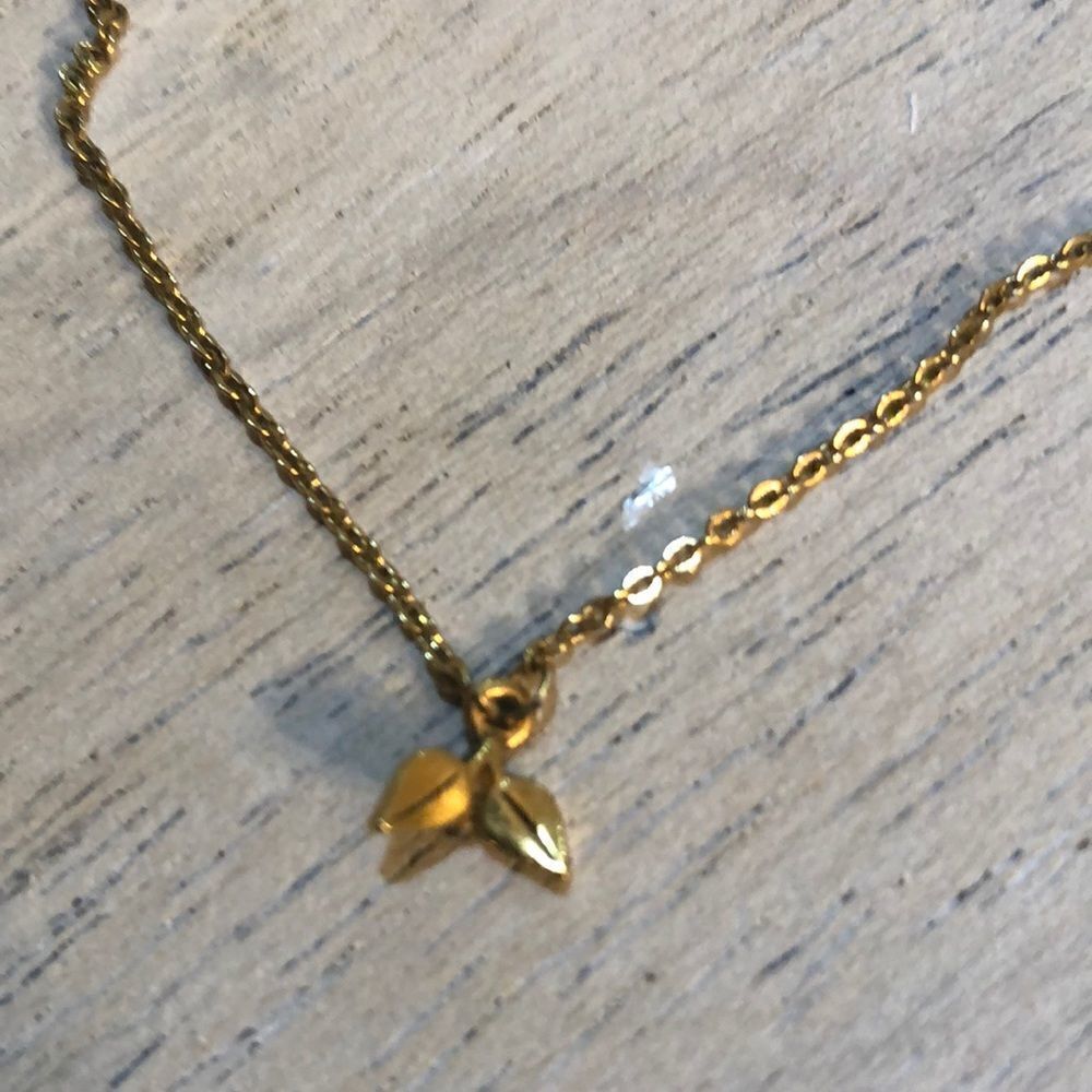 1928 Dainty gold leaf necklace.